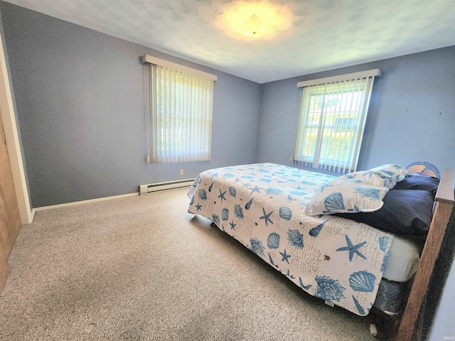3315 E Paulding Rd, Fort Wayne, IN 46816 - bedroom featuring baseboard heating and carpet