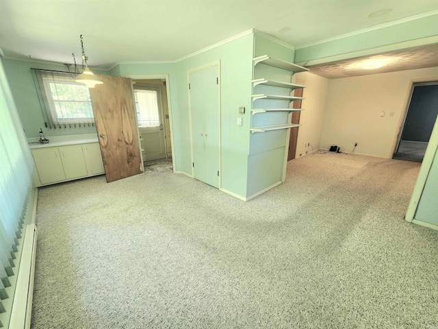 3315 E Paulding Rd, Fort Wayne, IN 46816 - carpeted spare room with crown molding and a baseboard heating unit