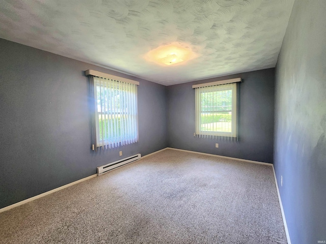 3315 E Paulding Rd, Fort Wayne, IN 46816 - unfurnished room with a baseboard radiator, carpet flooring, and a textured ceiling