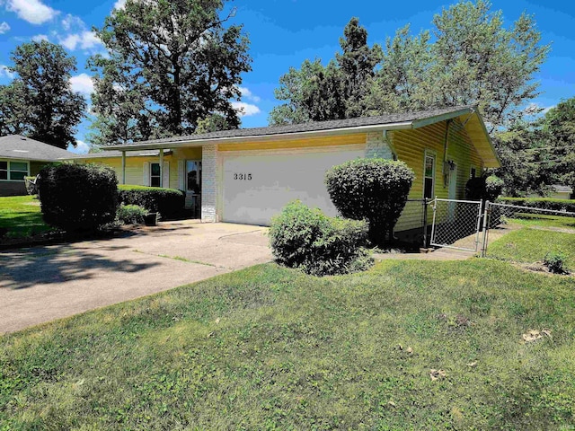 3315 E Paulding Rd, Fort Wayne, IN 46816 - view of front of home featuring a garage, driveway, and a gate