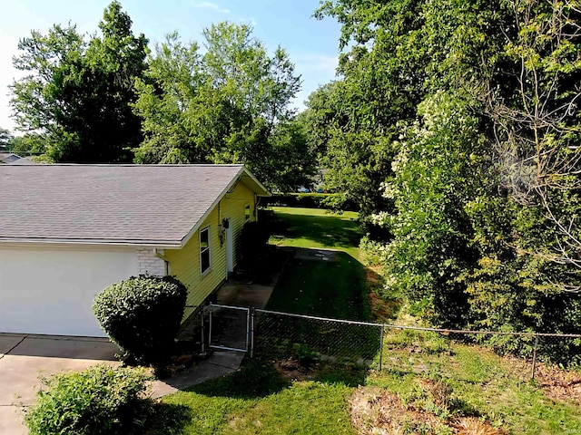 3315 E Paulding Rd, Fort Wayne, IN 46816 - view of property exterior featuring concrete driveway and a gate