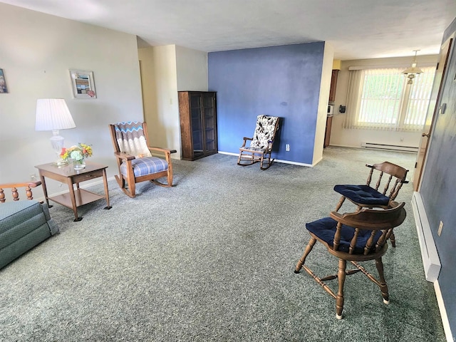 3315 E Paulding Rd, Fort Wayne, IN 46816 - sitting room featuring a baseboard radiator and carpet floors