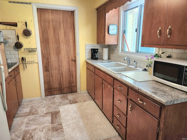 3315 E Paulding Rd, Fort Wayne, IN 46816 - kitchen with decorative backsplash and light countertops