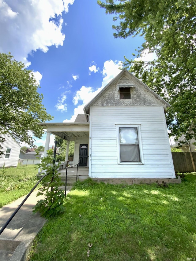 324 Tanguy St, Logansport, IN 46947 - bungalow-style house with a porch