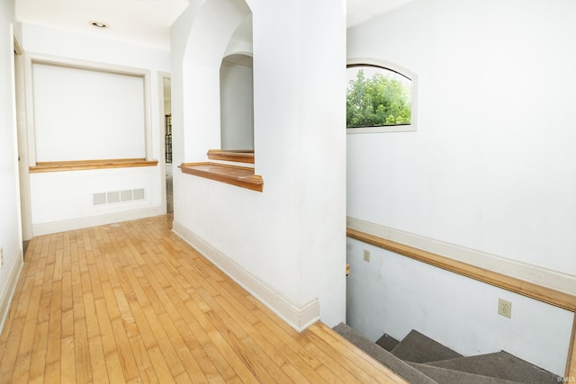 1121 W Grant St, Ellettsville, IN 47429 - corridor featuring wood-type flooring and baseboards