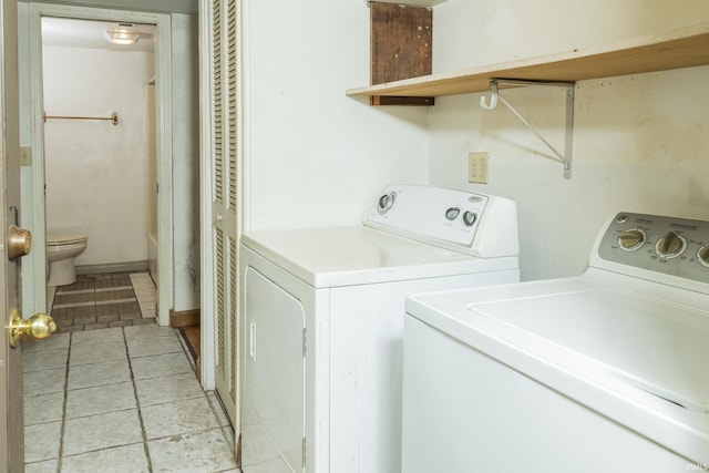 1121 W Grant St, Ellettsville, IN 47429 - laundry area featuring separate washer and dryer