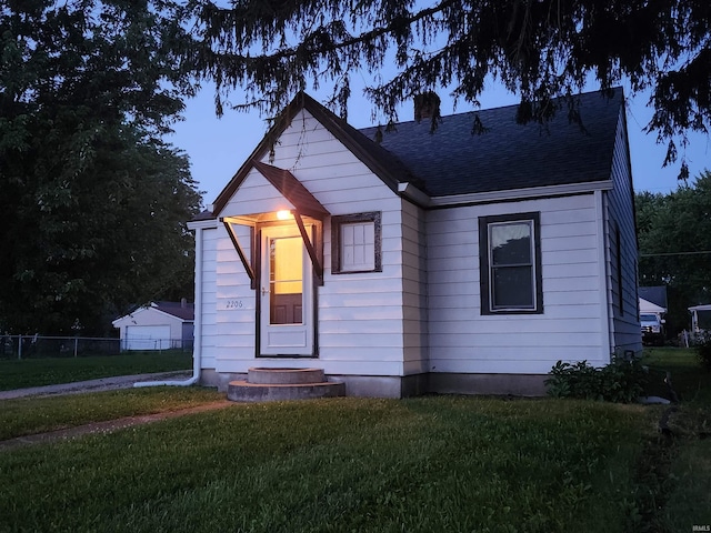 2206 S Hackley St, Muncie, IN 47302 - bungalow-style home with a shingled roof and a chimney