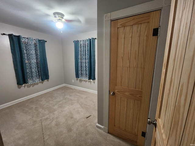 2206 S Hackley St, Muncie, IN 47302 - carpeted empty room with baseboards and a ceiling fan