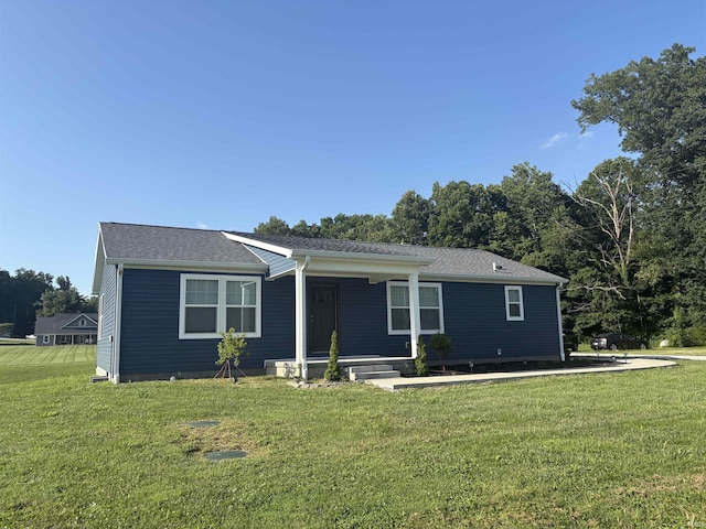 7775 N Hudson Ln, Solsberry, IN 47459 - view of front of property featuring a front lawn, a porch, and a shingled roof
