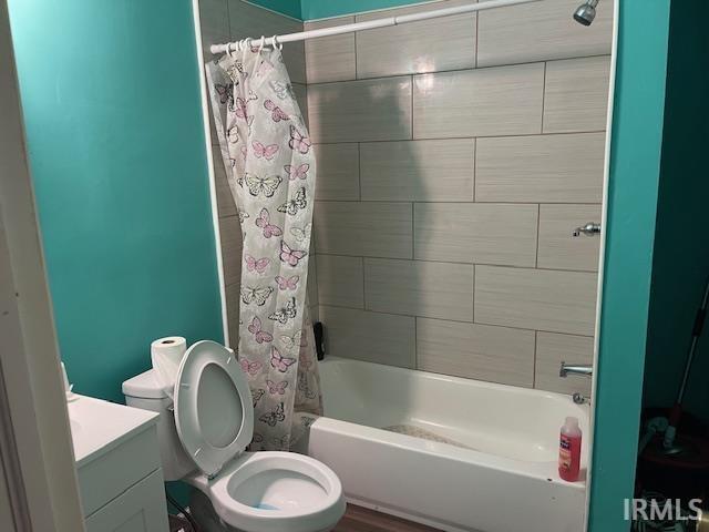 1919 Fletcher St, Anderson, IN 46016 - full bathroom featuring vanity and shower / tub combo