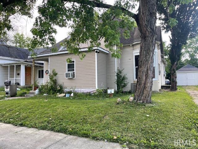 1919 Fletcher St, Anderson, IN 46016 - view of front of property with cooling unit and a front yard