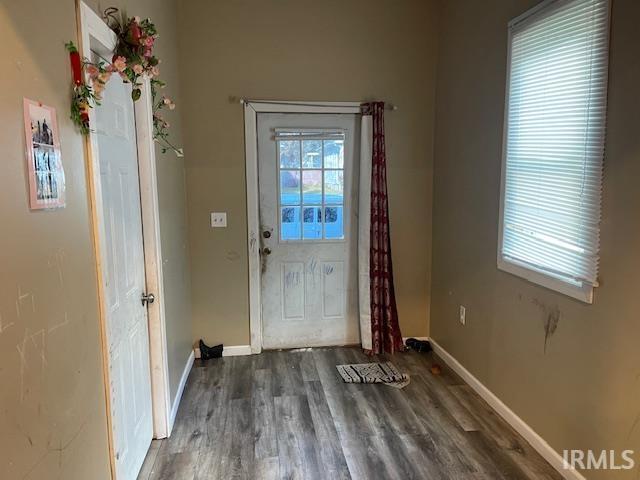1919 Fletcher St, Anderson, IN 46016 - doorway featuring wood finished floors and baseboards