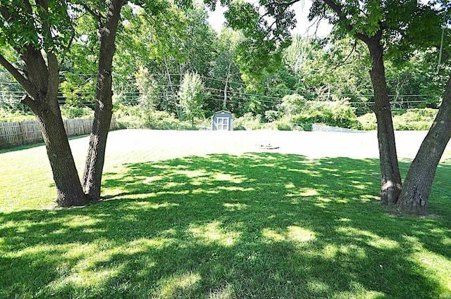 21573 Kern Rd, South Bend, IN 46614 - view of yard featuring a storage shed