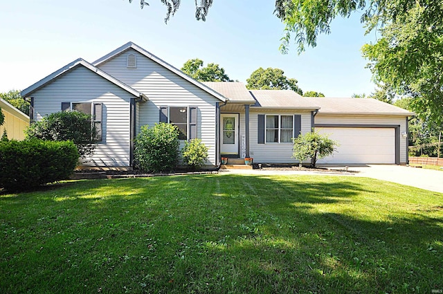 21573 Kern Rd, South Bend, IN 46614 - ranch-style house with an attached garage, driveway, and a front lawn