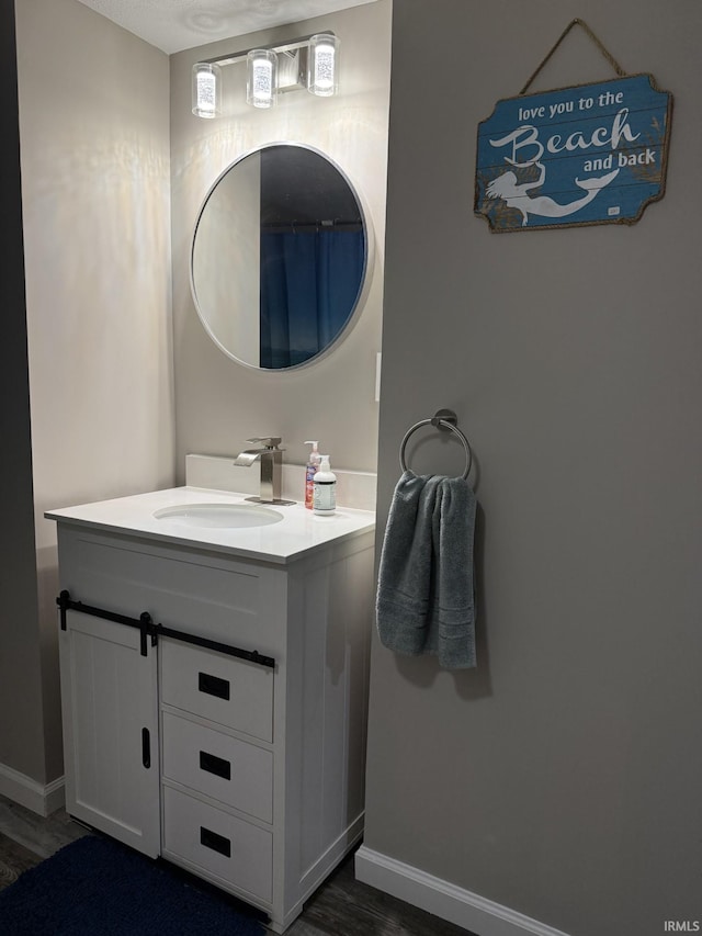 18460 Brewster Dr, Bristol, IN 46507 - bathroom featuring vanity and wood finished floors