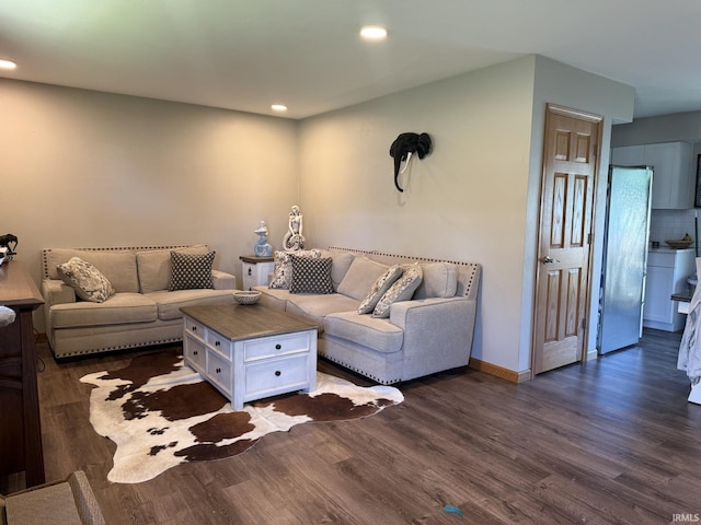 18460 Brewster Dr, Bristol, IN 46507 - living area featuring dark wood-type flooring and recessed lighting