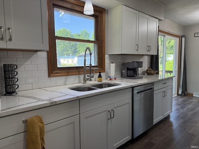 18460 Brewster Dr, Bristol, IN 46507 - kitchen with dishwasher, dark wood-style floors, white cabinetry, and light stone counters