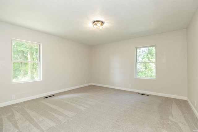 1725 Rainbow Bend Blvd, Elkhart, IN 46514 - carpeted empty room featuring baseboards