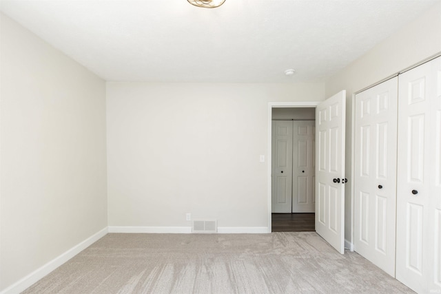 1725 Rainbow Bend Blvd, Elkhart, IN 46514 - unfurnished bedroom featuring light carpet and a closet