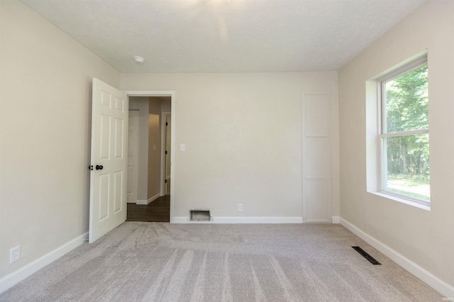 1725 Rainbow Bend Blvd, Elkhart, IN 46514 - unfurnished room with carpet and a smoke detector