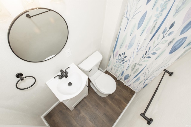 1725 Rainbow Bend Blvd, Elkhart, IN 46514 - bathroom with toilet and wood finished floors