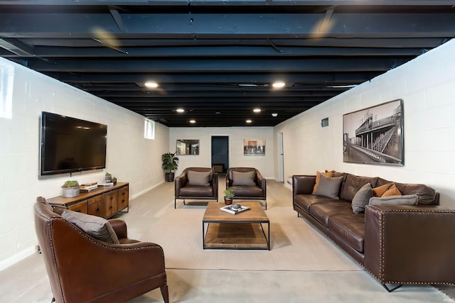 1725 Rainbow Bend Blvd, Elkhart, IN 46514 - living area featuring concrete block wall and carpet