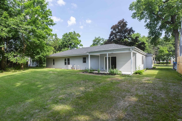 1725 Rainbow Bend Blvd, Elkhart, IN 46514 - back of property with a lawn