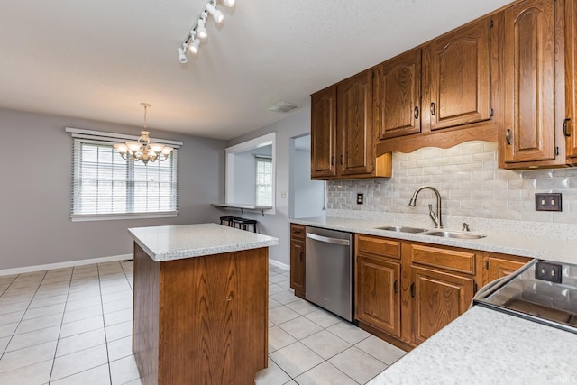 4301 W Friar Dr, Muncie, IN 47304 - kitchen featuring dishwasher, light tile patterned floors, a kitchen island, tasteful backsplash, and light countertops
