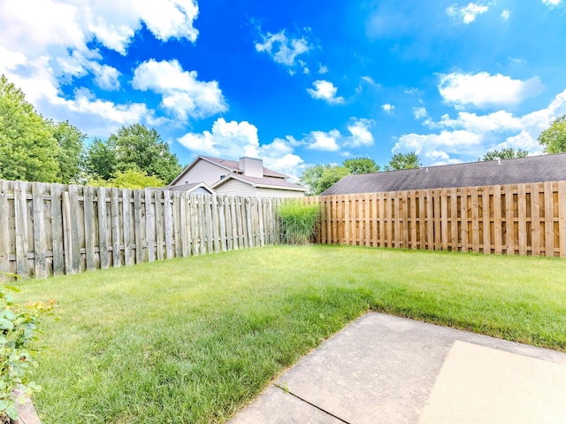 4301 W Friar Dr, Muncie, IN 47304 - fenced backyard with a patio