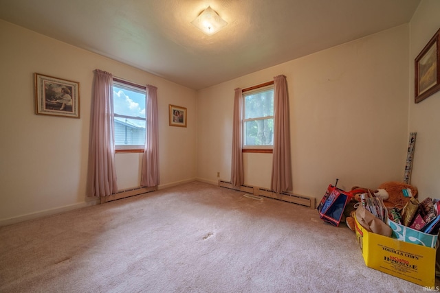 604 W 10th St, Jonesboro, IN 46938 - unfurnished room with a baseboard radiator and carpet