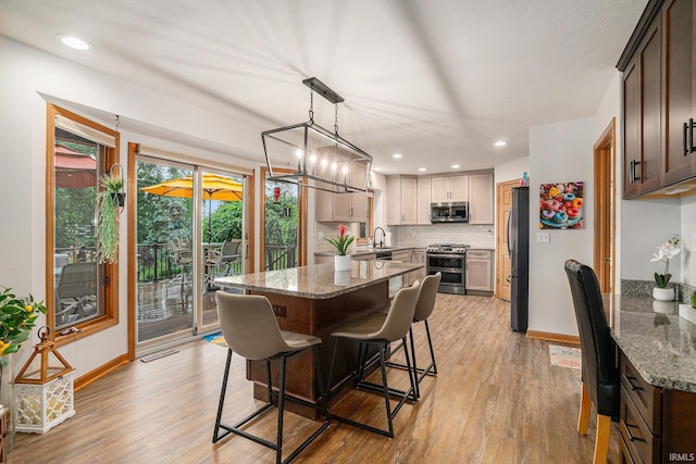 54454 Heron Cove Ln, Elkhart, IN 46516 - dining room featuring light wood-style floors and recessed lighting