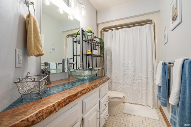 54454 Heron Cove Ln, Elkhart, IN 46516 - bathroom featuring vanity, tile patterned flooring, and a shower with shower curtain
