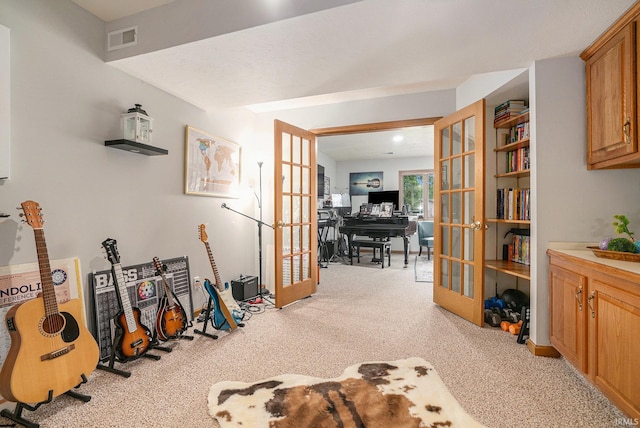 54454 Heron Cove Ln, Elkhart, IN 46516 - playroom with french doors, a desk, and light carpet