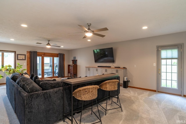 4365 N Maple Grove Rd, Bloomington, IN 47404 - living area featuring light colored carpet, recessed lighting, healthy amount of natural light, and a ceiling fan