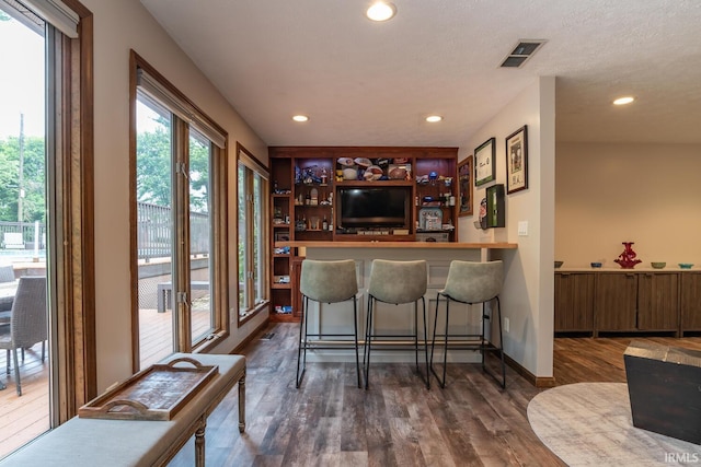 4365 N Maple Grove Rd, Bloomington, IN 47404 - bar featuring recessed lighting and dark wood-style flooring