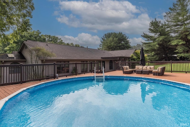4365 N Maple Grove Rd, Bloomington, IN 47404 - view of swimming pool featuring outdoor lounge area and a deck