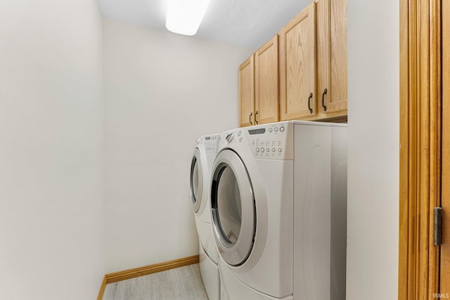 14920 Jasmine Key Ct, Fort Wayne, IN 46814 - laundry room with washer and dryer and cabinet space