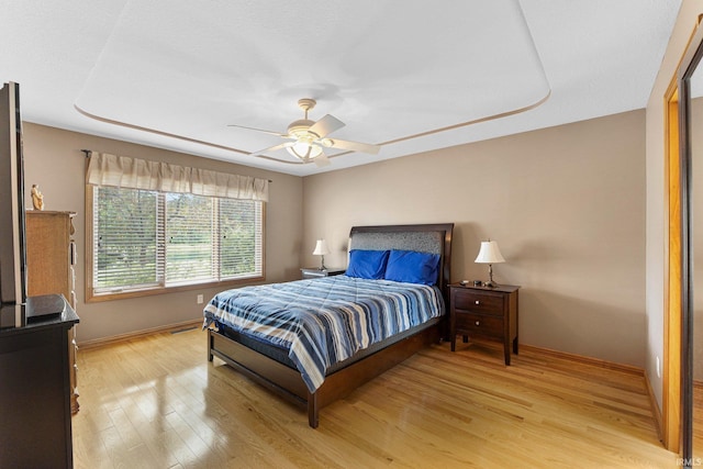 14920 Jasmine Key Ct, Fort Wayne, IN 46814 - bedroom with light wood-type flooring and a ceiling fan