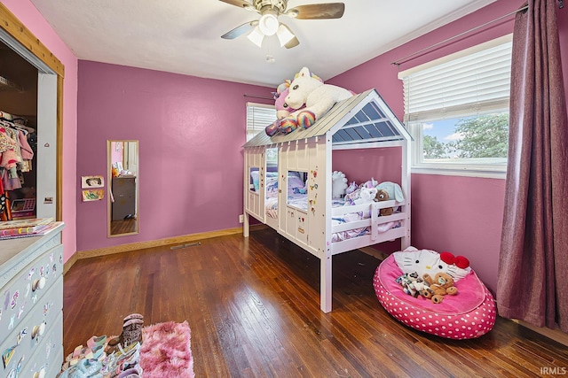 10227 E 500 S, Otterbein, IN 47970 - bedroom featuring hardwood / wood-style flooring, multiple windows, and ceiling fan