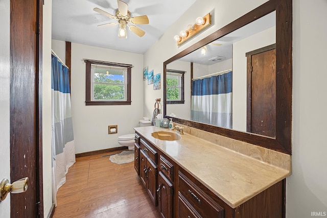 10227 E 500 S, Otterbein, IN 47970 - bathroom with vanity, wood finished floors, ceiling fan, and a shower with curtain