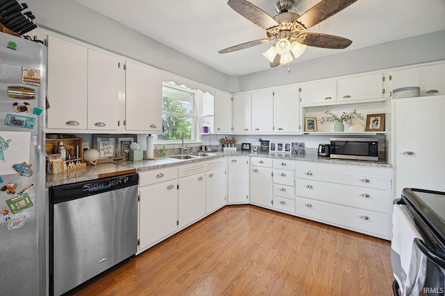 10227 E 500 S, Otterbein, IN 47970 - kitchen with appliances with stainless steel finishes, white cabinets, and ceiling fan