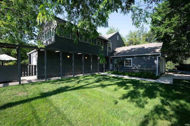 1144 N Warwick Rd, Muncie, IN 47304 - back of house with a yard