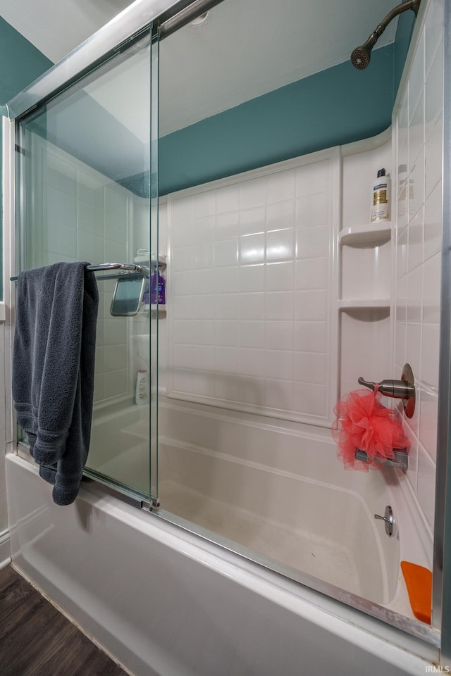 401 W Third St, Fairmount, IN 46928 - full bathroom with shower / bath combination with glass door and wood finished floors