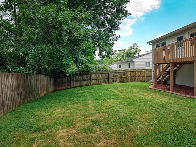 1313 Woodbine Ln, Evansville, IN 47710 - fenced backyard with stairs and a deck