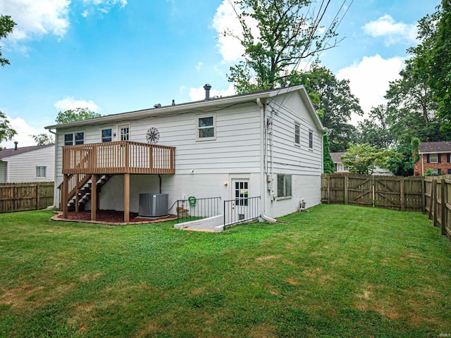 1313 Woodbine Ln, Evansville, IN 47710 - back of property featuring a fenced backyard, stairway, and a wooden deck