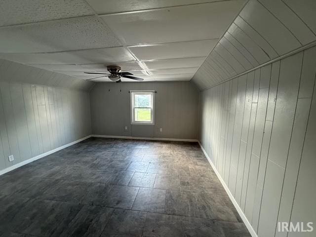 1021 W Franklin St, Evansville, IN 47710 - bonus room featuring wood walls, ceiling fan, and lofted ceiling