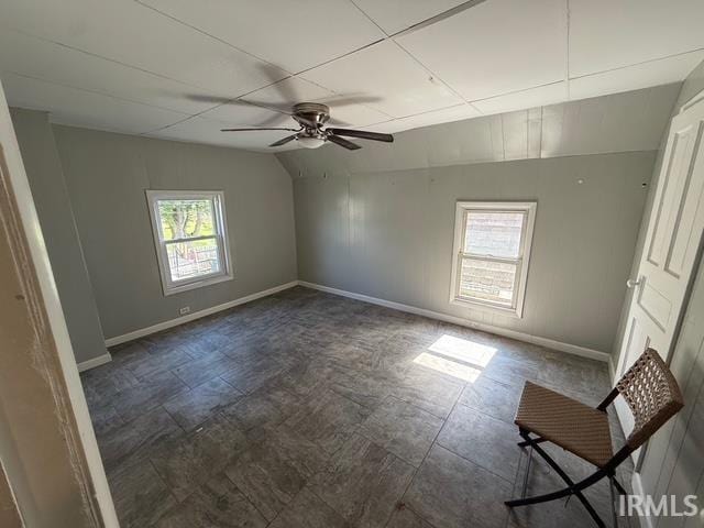 1021 W Franklin St, Evansville, IN 47710 - empty room featuring vaulted ceiling and ceiling fan