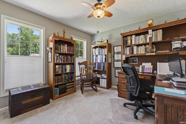 55359 Falling Water Dr, Elkhart, IN 46514 - home office featuring healthy amount of natural light, a ceiling fan, a textured ceiling, and carpet flooring