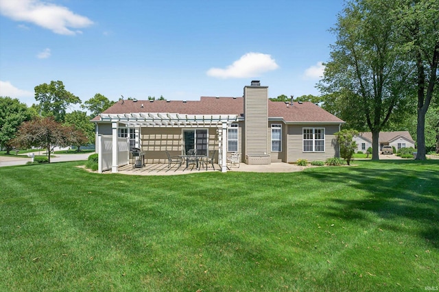 55359 Falling Water Dr, Elkhart, IN 46514 - back of property featuring a pergola, a patio area, a lawn, and a chimney