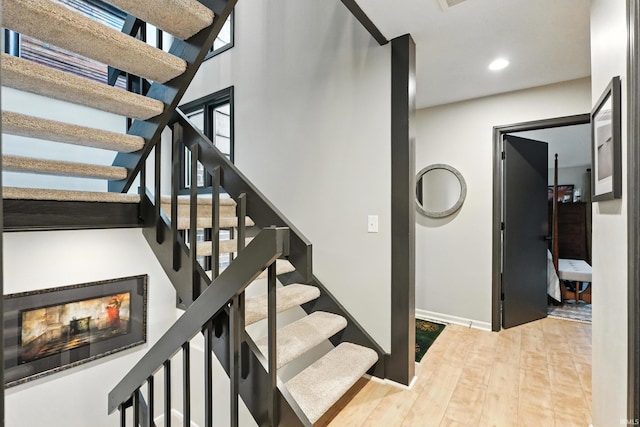 6756 Covington Creek Trl, Fort Wayne, IN 46804 - stairs with recessed lighting and wood finished floors